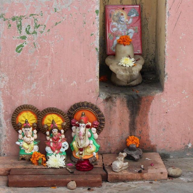 Deities for worship in a little streetside temple give everybody the gift of worship and divine connection