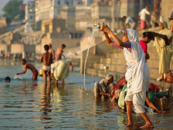 The Ganga embodies the timeless pursuit of spiritual freedom, purification, and atonement of karmas in exchange for offerings of prayer, flowers, fruits and ashes